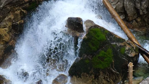 Mountain waterfall flowing on the rocks 스톡 동영상 112896770