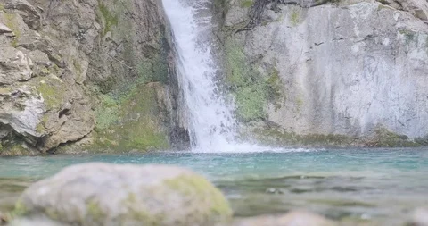 Mountain waterfall in the forest. Daytime shooting. 4K 29 fps Stock Footage 127446393