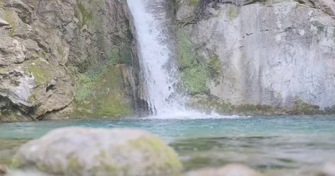 Mountain waterfall in the forest. Daytime shooting. 4K 60 fps Stock Footage 127457917