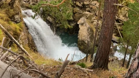Mountain waterfall in the forest Stock Footage 165778825