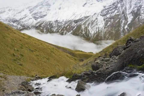 Mountain waterfall in the forest. Waterfall view. Waterfall in mountains. Wat Stock Photos