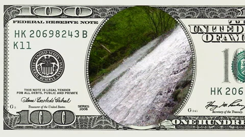 Mountain waterfall in frame of 100 dollar bill Stock Footage 97198713