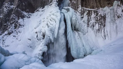 Mountain waterfall in ice Stock Footage 148401038