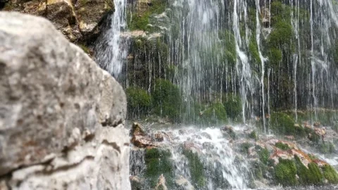 Mountain Waterfall over the rock Stock Footage