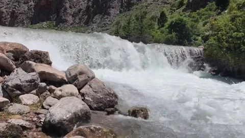 Mountain Waterfall Rushing Over Rocky Riverbed Video stock 341132861