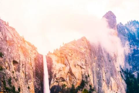 Mountain waterfall in sunset light Stock Photos
