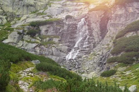 Mountain waterfall sunset Stock Photos