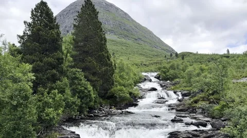 Mountain waterfalls cascading down rocky slopes 2 Видео 340238155