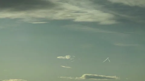 Mountain Wave Clouds and Contrails Stock Footage 54733705