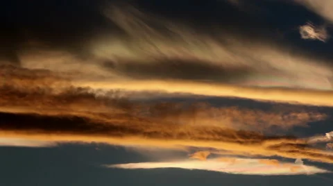 Mountain wave clouds glow in variety of Colorado sunset colors Video stock 54759647