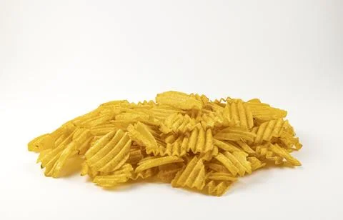 A mountain of wavy chips on a white background. The concept of obesity. Stock Photos