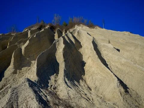 Mountain of white sand. Stock Photos