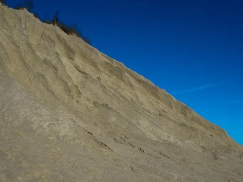 Mountain of white sand. Stock Photos