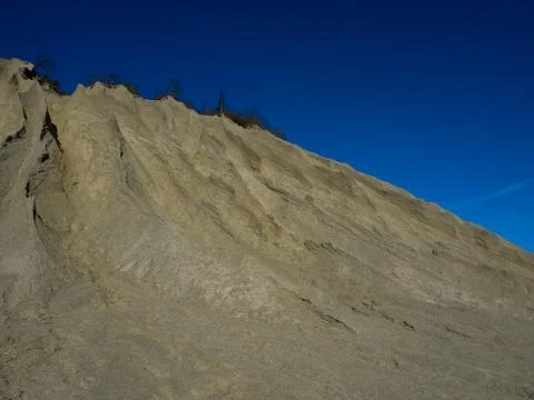 Mountain of white sand. Stock Photos
