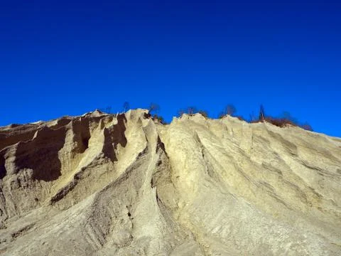 Mountain of white sand. Stock Photos