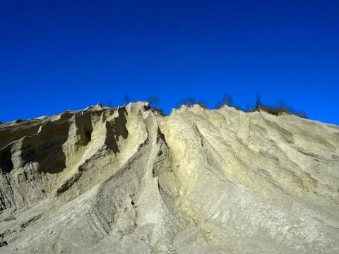 Mountain of white sand. Stock Photos