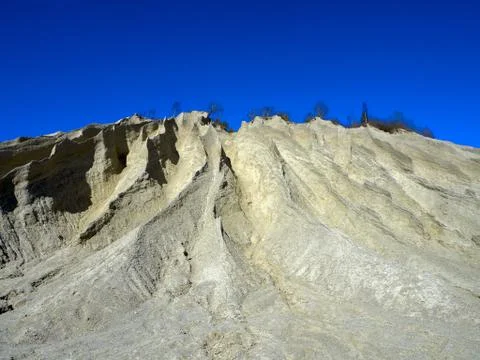 Mountain of white sand. Stock Photos