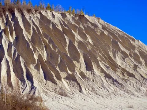 Mountain of white sand. Stock Photos