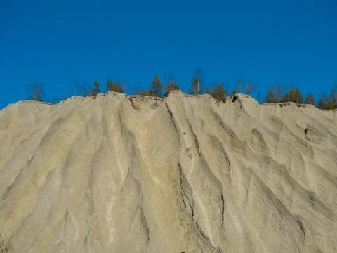 Mountain of white sand. Stock Photos
