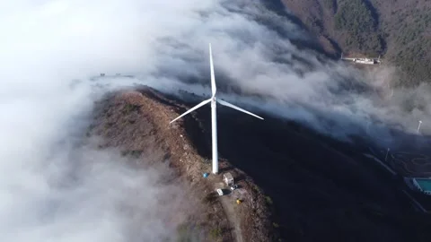 Mountain Wind Turbines Aerial Drone View with Majestic Sea of Clouds Stock Footage 326737481