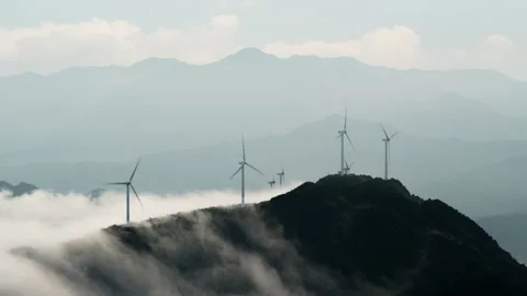 Mountain Wind Turbines and Cloud Sea Time-lapse with Energy Concept Stock Footage 326679117