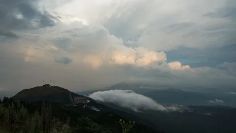 Mountain Wind Turbines Time-lapse with Rolling Clouds and Sea of Mist Stock Footage 326679347
