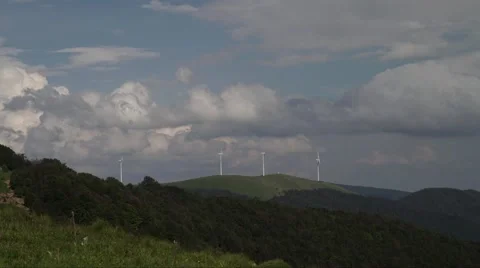 Mountain Wind Turbines Timelapse 4K Stock Footage 64209896