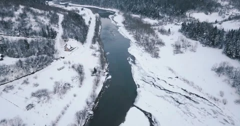 The mountain winter forest covered with snow with river Stock Footage 246866777