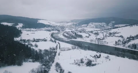 The mountain winter forest covered with snow with river Stock Footage 246866785