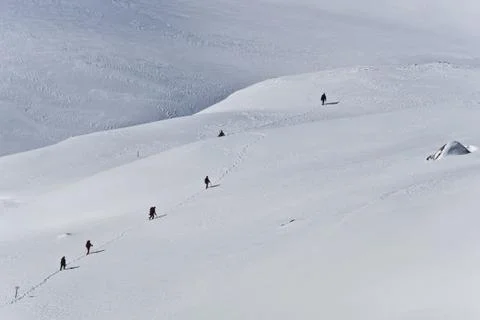 Mountain winter tourists Stock Photos