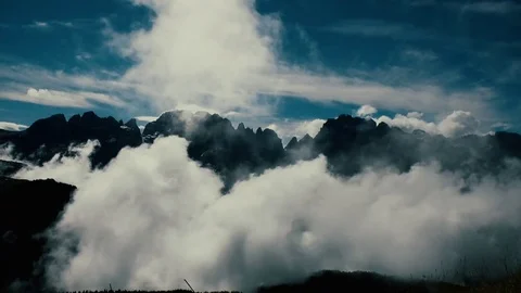Mountain wrapped in clouds Video stock 75236836