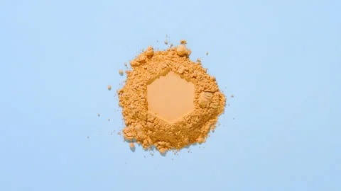 Mountain of yellow powder with hexagonal impression Stock Footage 337116894