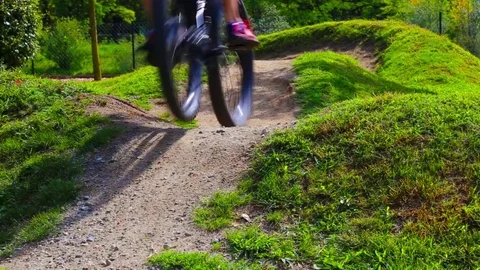 Mountainbiking in a bike parcours Stock Footage 101036334