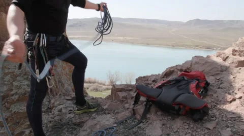 Mountaineer with climbing equipment Stock Footage 61284553
