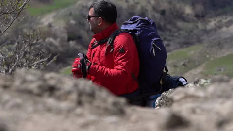 Mountaineer Climbing a Mountain Video stock 303593829