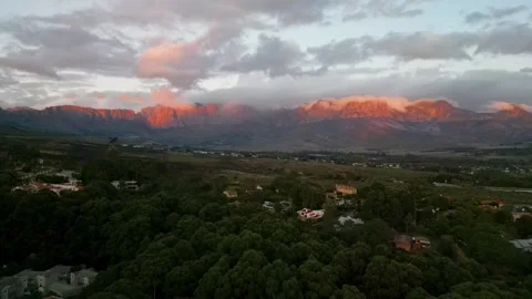 Mountainfront at sunset shot with a drone Stock Footage 270166963