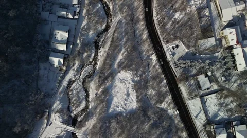 A mountainous area with a river and various houses. Stock Footage 295393258
