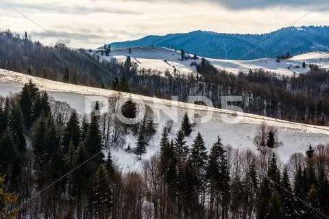 Mountainous area on winter morning Stock Photos