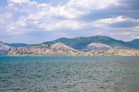 Mountainous coastline Stock Photos