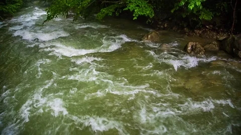 Mountainous high river flow. Slow motion. Stock-Footage 85887669