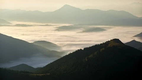 Mountainous hilly landscape,inverted clouds in the valley landscape , after Stock-Footage 250521805