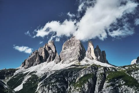 Mountainous landscape with clouds in Three Peaks Nature Park in Italian dolomite Stock Photos