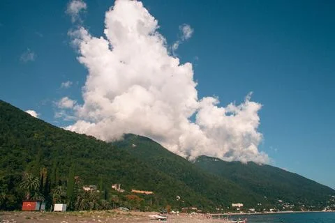 Mountainous Landscape with Expansive Clouds Stock Photos