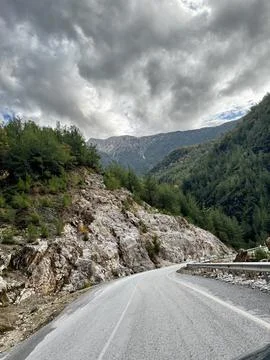 Mountainous road sky Stock Photos