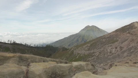 Mountainous terrain with clouds over it Stock Footage 87145443