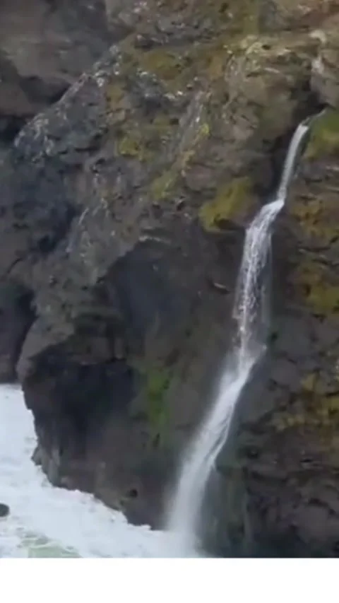 A mountainous terrain, rocky formations, flowing water, and waterfalls. Stock-Footage 335449116