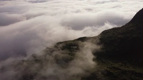 Mountains above the clouds aerial Stock Footage 160170877