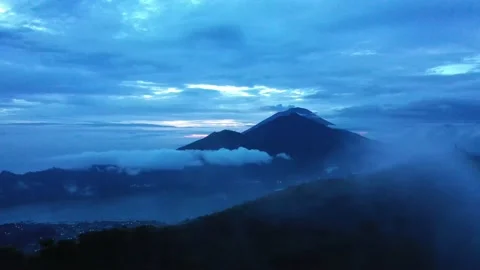 Mountains Above the Clouds in Bali Drone Shot Mount Batur Sunrise Stock Footage 143834783