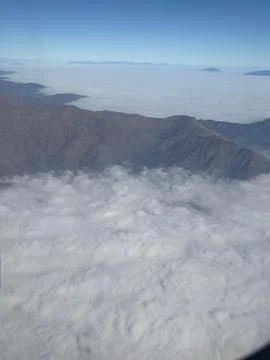 Mountains Above the Clouds Stock Photos