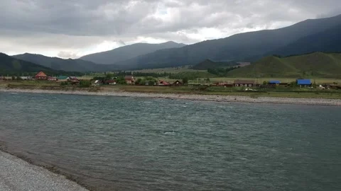 Mountains above the river Stock Footage 136914617